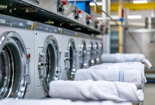 [freepicdownloader.com]-commercial-laundry-machines-dry-cleaning-services-with-ample-space-text-placement-normal